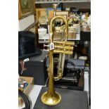 A BRASS BOOSEY & HAWKES 606 TRUMPET, with mouthpiece