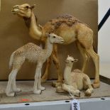 THREE COUNTRY ARTISTS RESIN SCULPTURES OF CAMELS, the tallest, the mother is standing and is