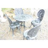 A BLACK PAINTED ALUMINUM GARDEN TABLE, and four chairs (5)