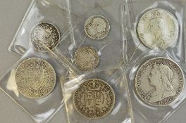 A COLLECTION OF SEVEN MIXED SILVER COINS