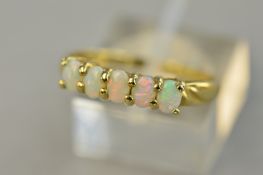 AN OPAL FIVE STONE HALF HOOP RING, ring size P, approximate weight 1.6 grams