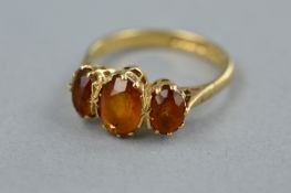 A 9CT GOLD CITRINE THREE STONE RING, ring size N1/2, approximate gross weight 3.3 grams