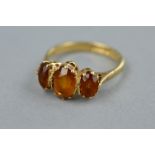 A 9CT GOLD CITRINE THREE STONE RING, ring size N1/2, approximate gross weight 3.3 grams