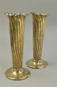 A PAIR OF SILVER FLUTED VASES, approximate weight 250 grams, (damaged)