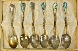 A BOXED SET OF SILVER TEASPOONS, marked S.T.G.