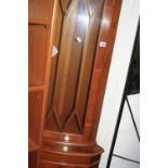 A YEW WOOD CORNER CUPBOARD