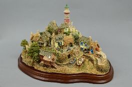 A BOXED LIMITED EDITION LILLIPUT LANE SCULPTURE, 'Out of the Storm' No.194/3000, certificate and