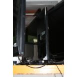 A SHARP 32' LCD TV (remote)