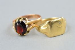 TWO GENT'S SIGNET RINGS, a 9ct gold garnet single stone claw set, ring size S1/2, a cushion shape
