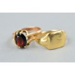 TWO GENT'S SIGNET RINGS, a 9ct gold garnet single stone claw set, ring size S1/2, a cushion shape