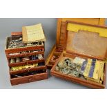 A COLLECTION OF DENTISTRY ITEMS, in three boxes to include plates, dentures, denture moulds, tooth