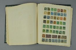 AN OLD TIME COLLECTION OF STAMPS, in an album with Rhodesia 1905 falls set used, 1910-17 double