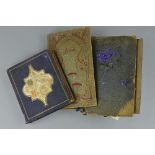 THREE POSTCARD ALBUMS, contents dating from the Victorian/Edwardian era and featuring many