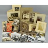 A LARGE COLLECTION OF EARLY TO MID 20TH CENTURY PHOTOGRAPHS AND POSTCARDS, loose and in small