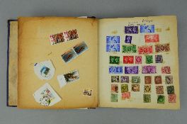 A STANLEY GIBBONS STAMP ALBUM, including Great Britain, World stamps, etc