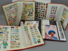 FIVE ALBUMS AND STOCKBOOKS OF STAMPS AND COVERS, including Queen Mother commemorative gold coin