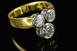 A LATE 20TH CENTURY 18CT GOLD TREFOIL DESIGN DIAMOND RING, comprised of three modern round brilliant