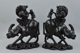 A PAIR OF EARLY 20TH CENTURY CARVED CHERRY ROOT FIGURES, with wire inlay, each depicting a naked