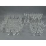 A SUITE OF STUART CRYSTAL BEACONSFIELD PATTERN DRINKING GLASSES AND TABLEWARES, comprising ten