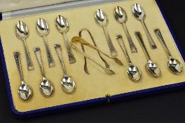 A GEORGE VI CASED SET OF TWELVE SILVER COFFEE SPOONS AND MATCHING SUGAR TONGS, makers Mappin & Webb,