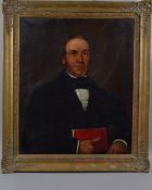 19TH CENTURY BRITISH SCHOOL, Half length portrait of a gentleman holding a red book to his chest,