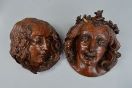 TWO VICTORIAN CARVED OAK WALL MASKS OF FEMALE HEADS, one side profile looking to the right with