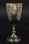 AN EDWARDIAN SILVER TROPHY CUP, gilt interior, on a cylindrical stem with beaded rims and foot rims,