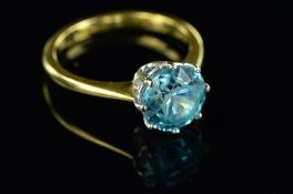 A MID-LATE 20TH CENTURY 18CT GOLD SINGLE STONE BLUE ZIRCON RING, one mixed cut blue Zircon measuring
