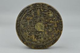 A 19TH CENTURY CHINESE CANTON TORTOISESHELL CIRCULAR BOX AND COVER, the lid carved with a border