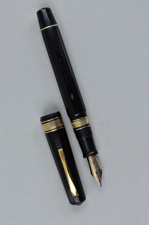 AN OMAS 557-F FOUNTAIN PEN, in black and gold, stamped Omas 557-F, with 1922 along the same facet, - Image 2 of 3