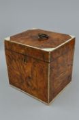 A GEORGE III BURR YEW, IVORY AND FAUX IVORY TEA CADDY, of rectangular form, the hinged cover with