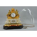 A LATE 19TH CENTURY GILT METAL AND ALABASTER FIGURAL MANTEL CLOCK, building design surmount with