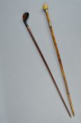 A LATE 19TH CENTURY WALKING CANE WITH GOLF CLUB HANDLE, inlaid decoration, length approximately
