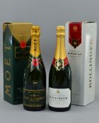 A BOXED BOTTLE OF BOLLINGER, and a boxed bottle of Moet (2)