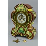 A LATE 19TH CENTURY MAJOLICA CASED MANTEL CLOCK, the case of domed and scrolled form moulded in