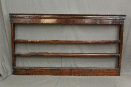 A GEORGE III OAK PLATE RACK, the moulded cornice above three shelves, width 203cm x height 112cm x