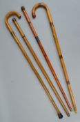 THREE LATE VICTORIAN/EARLY 20TH CENTURY NOVELTY WALKING STICKS/CANES, comprising a tipple stick
