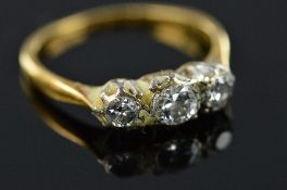 A MID 20TH CENTURY THREE STONE DIAMOND RING, estimated total brilliant cut diamond weight 0.60ct,
