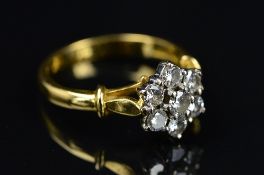 A MODERN 18CT GOLD DIAMOND ROUND CLUSTER RING, estimated total modern round brilliant cut diamond
