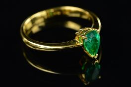 A MODERN SINGLE STONE PEAR SHAPED EMERALD RING, emerald measuring approximately 7.3mm x 5.2mm,