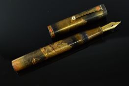 A PRE DUNHILL NAMIKI LAKE AND HILLSIDE TAKAMAKI-E FOUNTAIN PEN, an intricate and highly