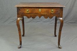 A GEORGE III OAK SIDE TABLE, the rectangular top with moulded edge above a single drawer with