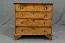 A GEORGE III MAHOGANY CHEST OF FOUR LONG GRAUDATED DRAWERS, the top with moulded edge, brass