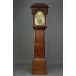A GEORGE III MAHOGANY LONG CASE CLOCK, the hood with caddy top on half column supports flanking