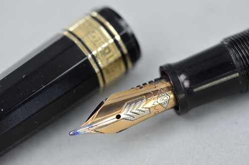 AN OMAS 557-F FOUNTAIN PEN, in black and gold, stamped Omas 557-F, with 1922 along the same facet, - Image 3 of 3