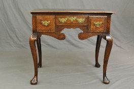 A GEORGE III OAK SIDE TABLE, the rectangular top with moulded edge over an arrangement of three