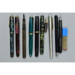 A PARKER DUOFOLD FOUNTAIN PEN, in green and gold, a Parker Vector fountain pen in black, a Wyvern