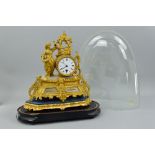 A 19TH CENTURY GILT METAL AND ALABASTER FIGURAL MANTEL CLOCK, cast with a girl holding a bird cage