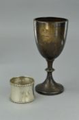 A SILVER CUP AND NAPKIN RING, approximate weight 85.6 grams