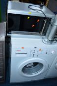 A BOSCH WASHING MACHINE, and a Russell Hobbs microwave (2)